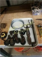 Assorted vintage casters, tools, wire
