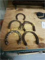 5 vintage steel horseshoes