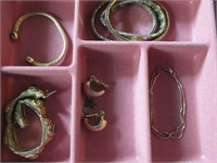 Bracelets and clip earrings
