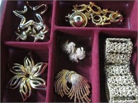 Bracelets, pins, clip earrings