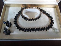 Trifari necklace, bracelet and clip earrings