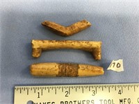St. Laurence Island ivory artifacts: 2 handles and