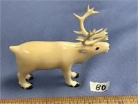 3 1/2" x 3" fossilized ivory carving of a caribou,