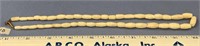 18" strand of tubular shape ivory beads of core iv
