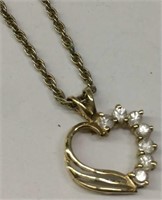 10k Gold Heart Pendant With Clear Stones