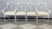 Set of white iron garden chairs