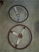 Two old steering wheels