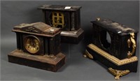 Group of Three Cast Iron Clocks