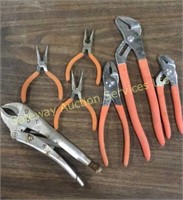 Assorted pliers vice grips channel locks and