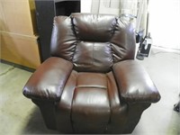 Brown leather recliner(note cat damage)
