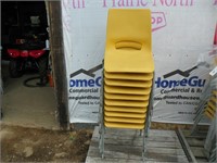 10 yellow stacking chairs(sell for one money)