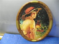 Oval Coca-Cola tray with girl (17"X14")