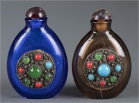 Pair of glass snuff bottles.