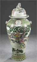 Pair of Chinese famille verte jars with lids.