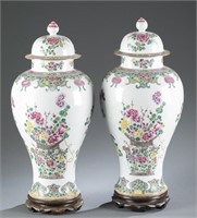 Pair of Chinese famille rose lidded jars.
