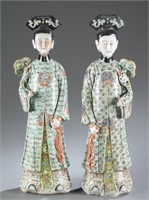 Pair of famille rose court lady statues..