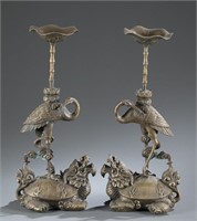 Pair of bronze animal candlesticks.