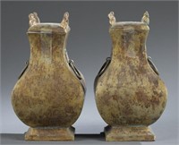 Pair of copper Fanghu vases with covers.