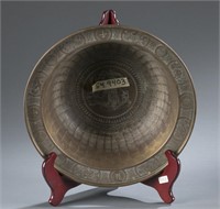 A Chinese bronze basin.