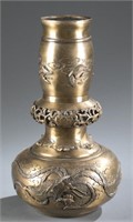 A cast brass double gourd vase.