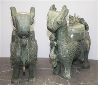 Pair of carved celadon hardstone mythical beasts.