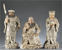 Set of 3 carved stone sculptures.