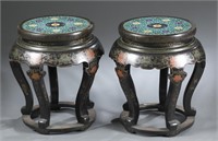 Pair of lacquer stools with cloisonne tops.