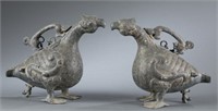Pair of archaic bronze bird wine vessels.