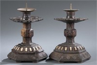 Pair of Chinese wood candlesticks.