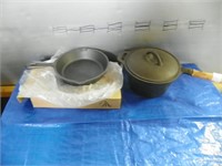 Unused 8" cast iron fry pan & a cast pot
