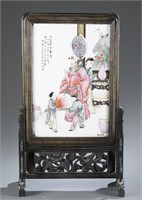A Chinese porcelain table screen.