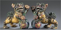 Pair of Chinese polychrome Fu lions.