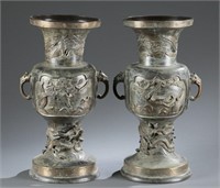 Pair of Japanese bronze urns.