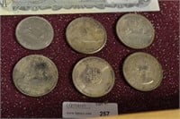 6 Canadian silver dollars