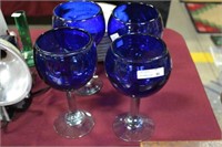 set of blue stemware