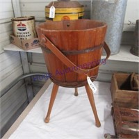Wooden bucket on stand