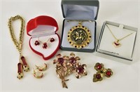 Collection Of Red And Gold Jewelry