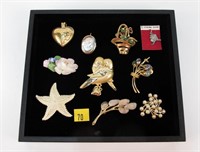 Lot, costume jewelry, pins and pendants