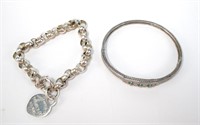 Lot, two sterling silver bracelets