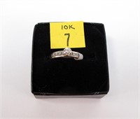 10K Yellow gold diamond solitaire with channel