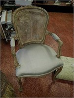 Cream and wood side chair with cane back