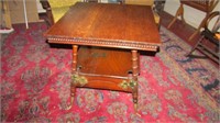 Oak parlour table with brass hardware