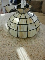 Tan and white stained glass hanging light