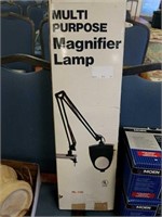 Multi purpose magnifier lamp