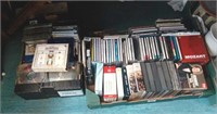 Two boxes of CDs