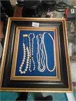 Four pearl necklaces