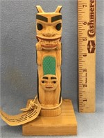 Tlingit style totem, wood, 7" long - imported