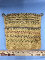 Hand woven grass wall hanger with pouch, with dyed