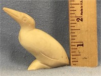 White soapstone carving of a raven 2.5" tall