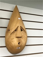 Unusual tear dropped shaped shirt mask carved out